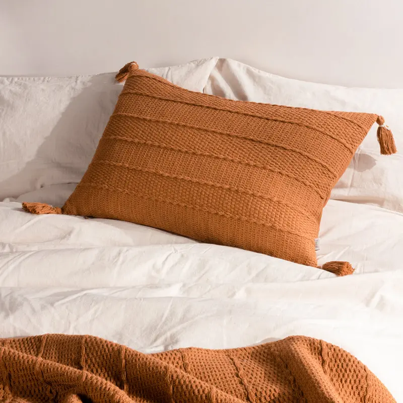 Caliche Textured Tasselled Cushion Ginger 1